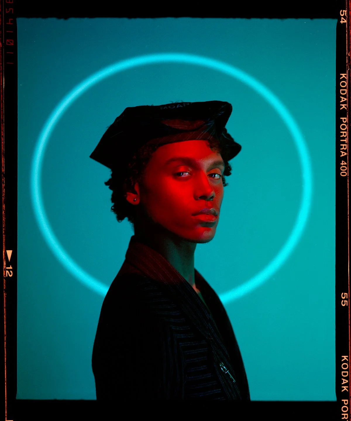 Fashion campaign portrait with coloured lighting