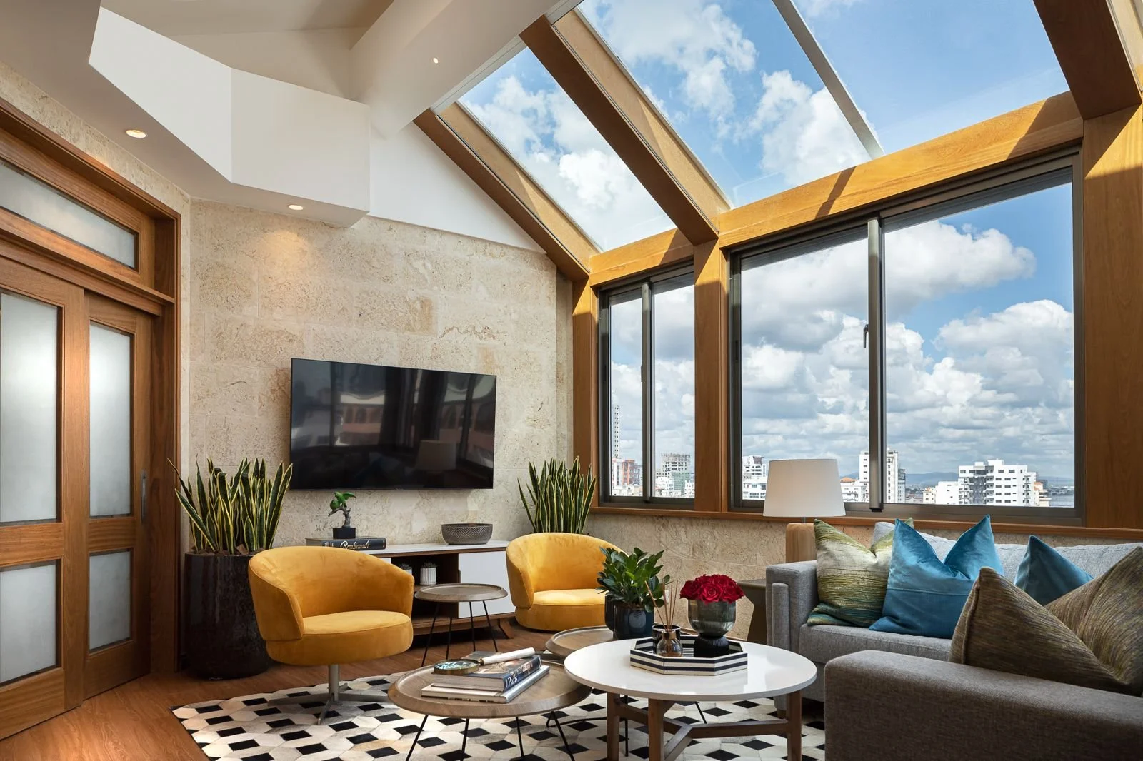 Modern staircase with brick wall and art