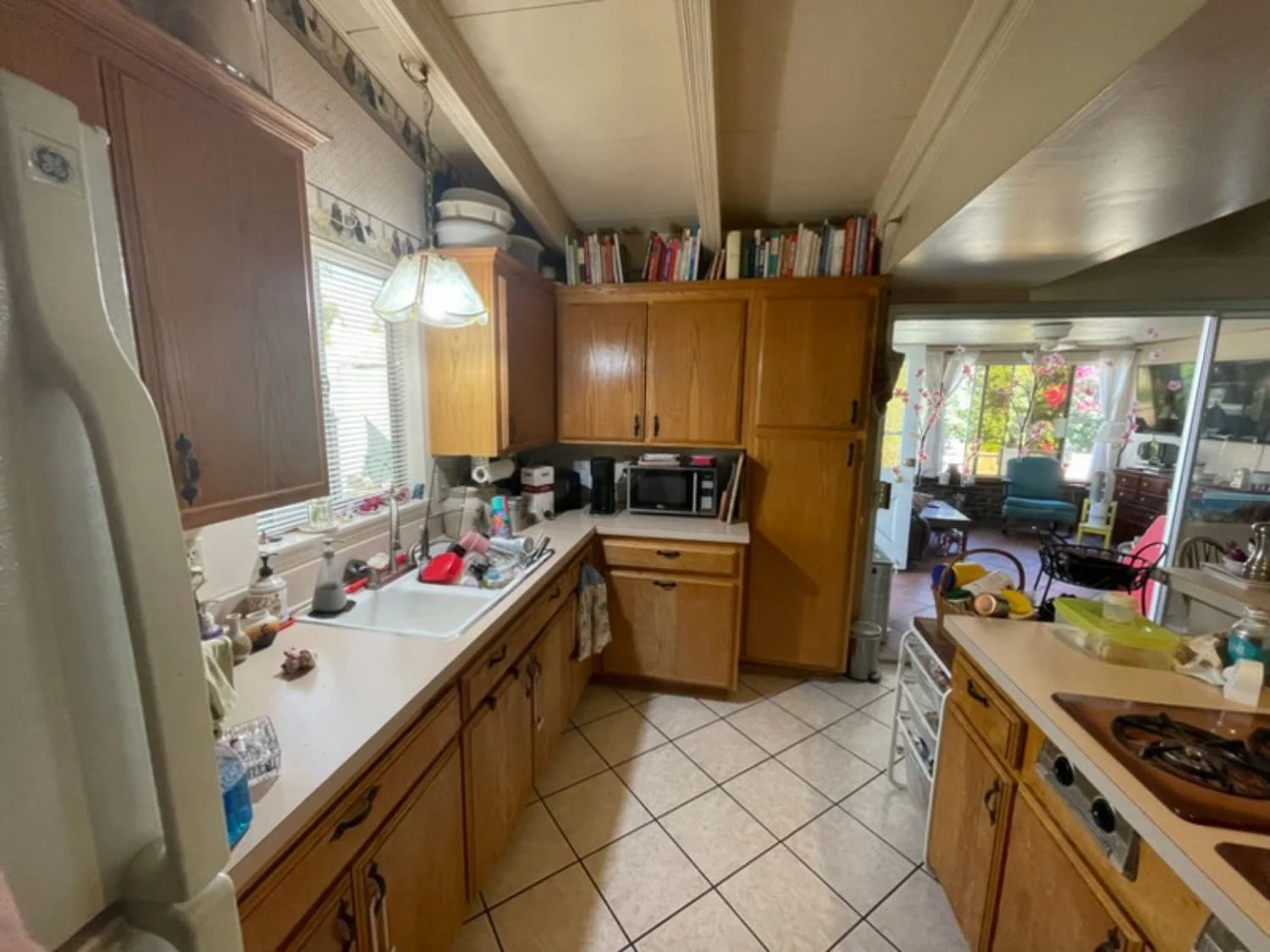 Original kitchen layout and finishes before the update