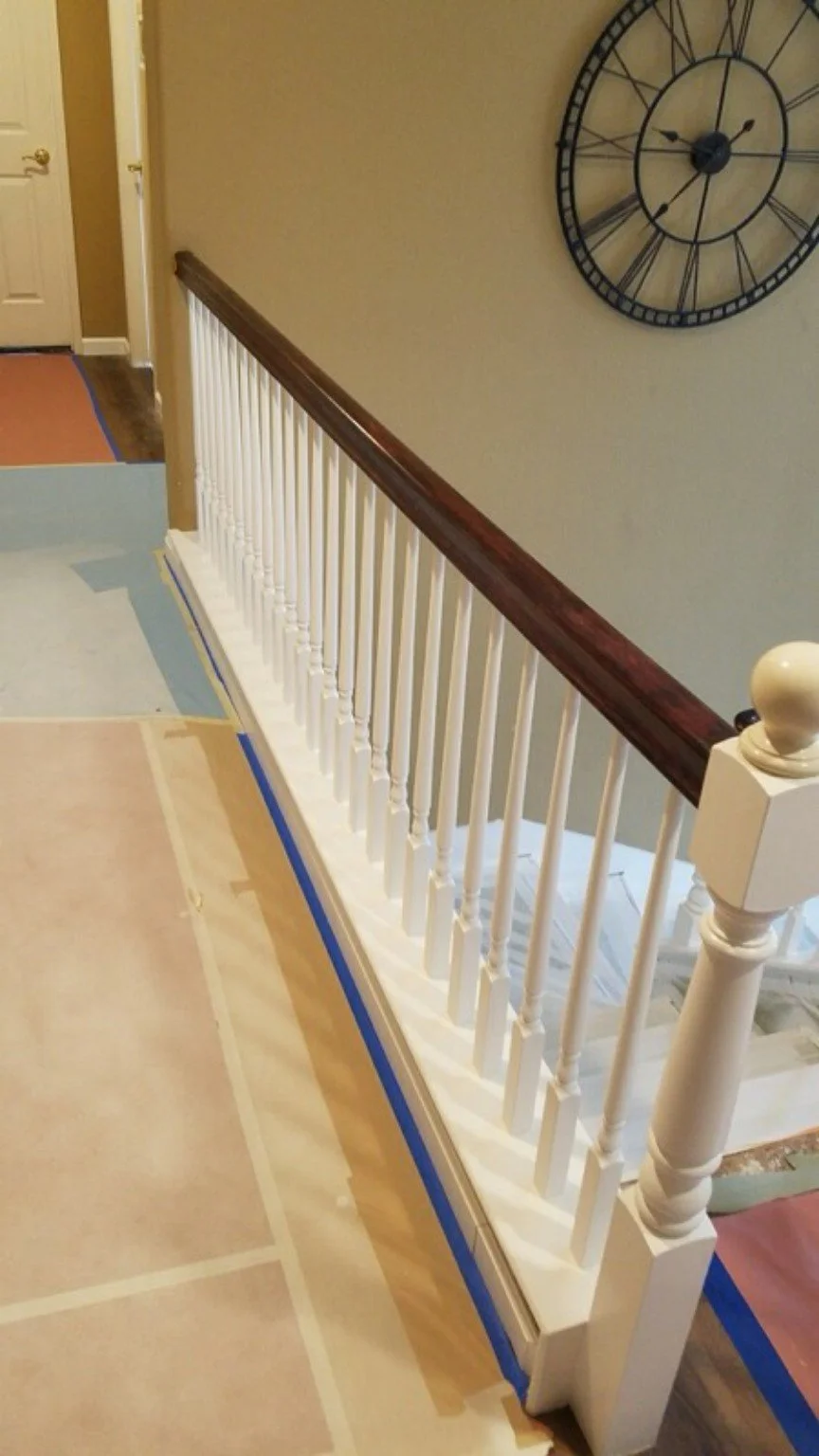 Upper landing railing detail during the finishing process
