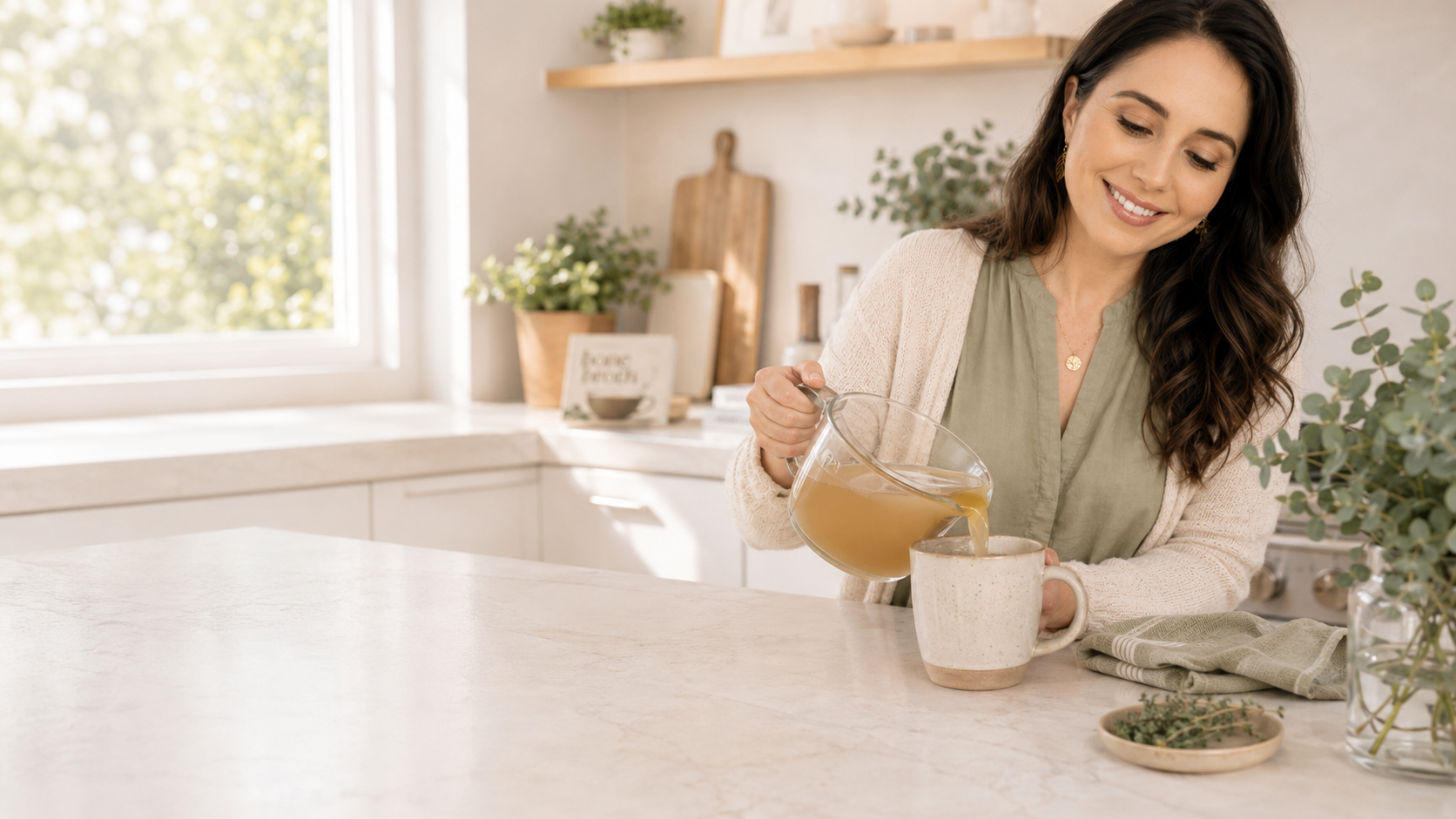 Leslie Knueven, Nutritional Therapy Practitioner, preparing nourishing bone broth for postpartum recovery