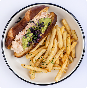 Sandwich served with seasoned fries