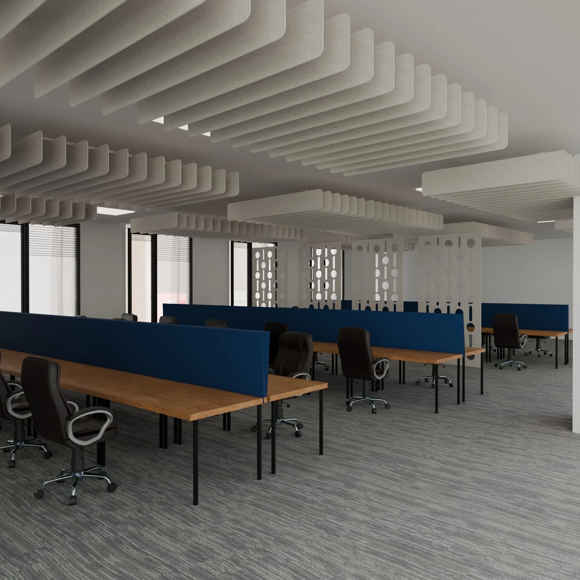 Akusticni paneli za plafon su na slici, u plavoj boji. Na slici se moze videti i televizor kao i kancelarijski sto i stolice.