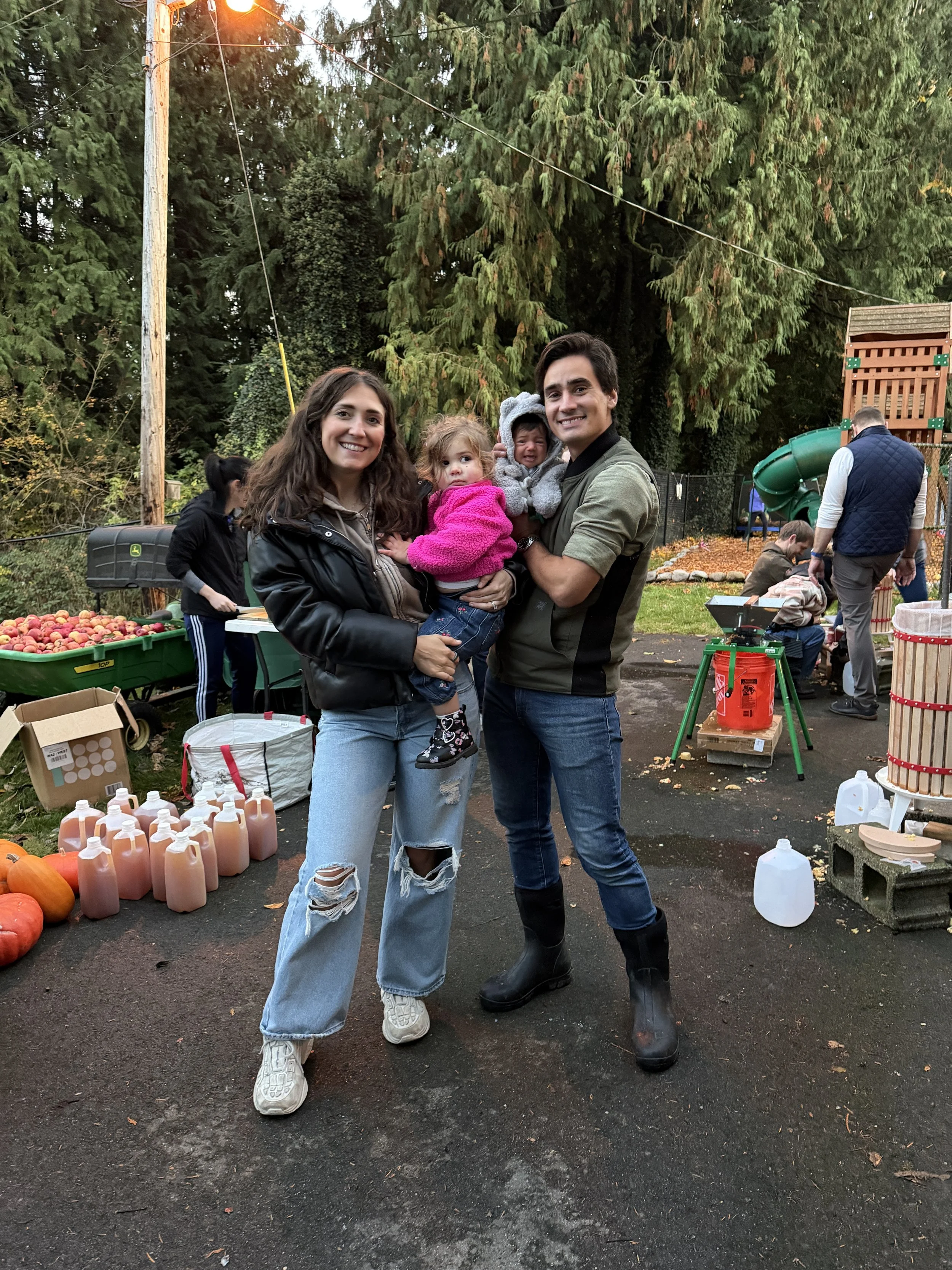Bella with family at cider press