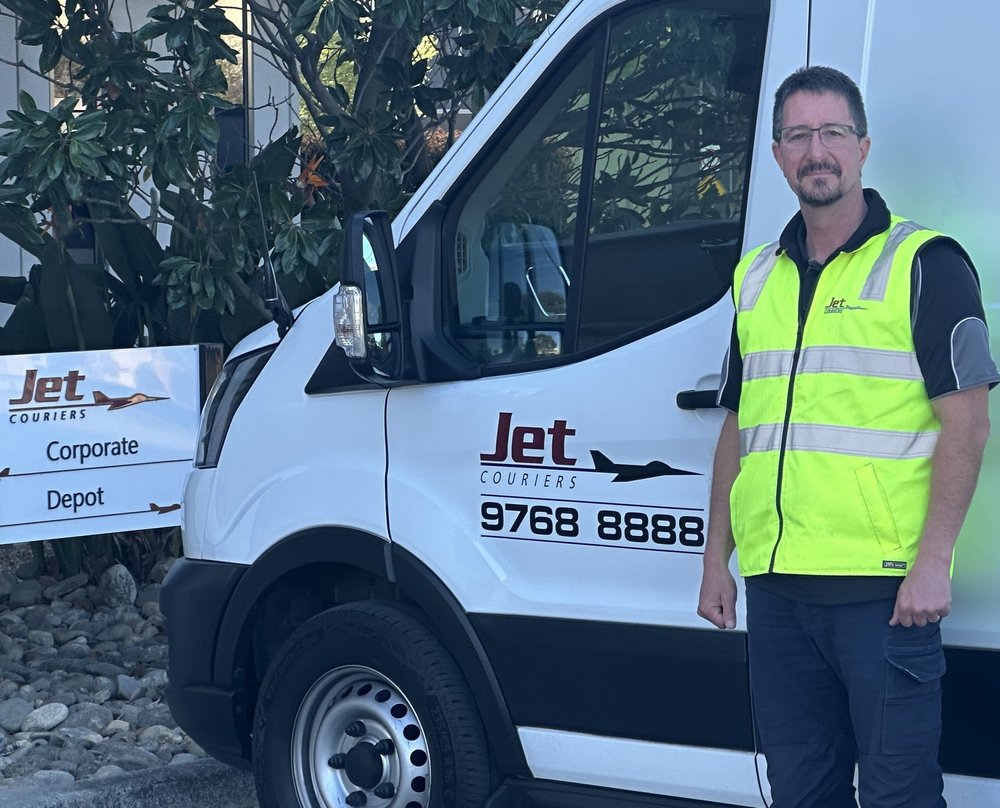 Jet Couriers Owner Driver with his white courier vehicle