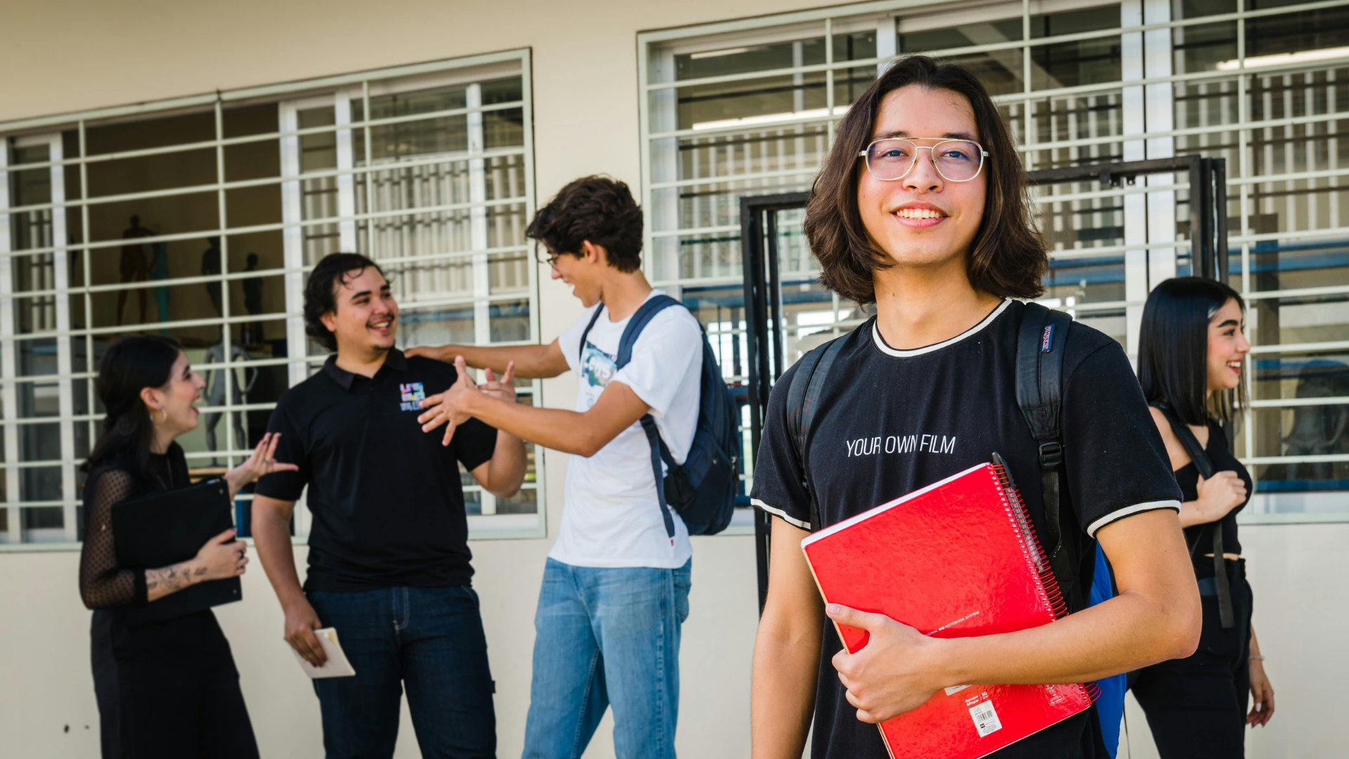 Students spending time together outside a school