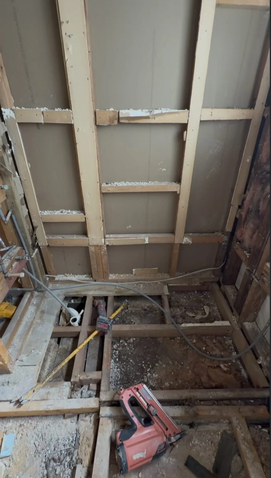 Parnell bathroom stripped back to bare timber studs and floor joists during renovation