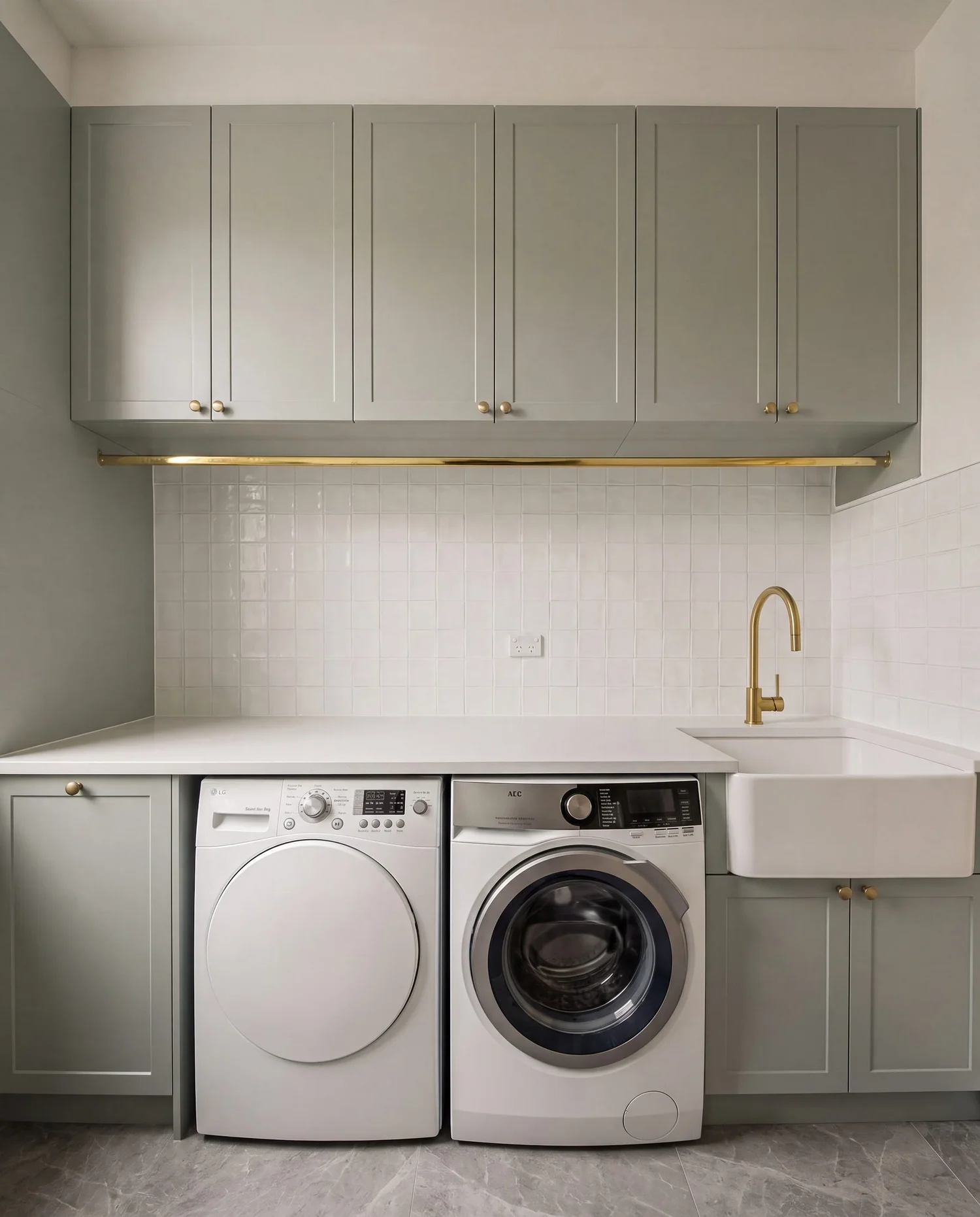 Finished laundry renovation in Bayswater Auckland, Dezignatek Pistachio cabinetry and ABI brass tapware
