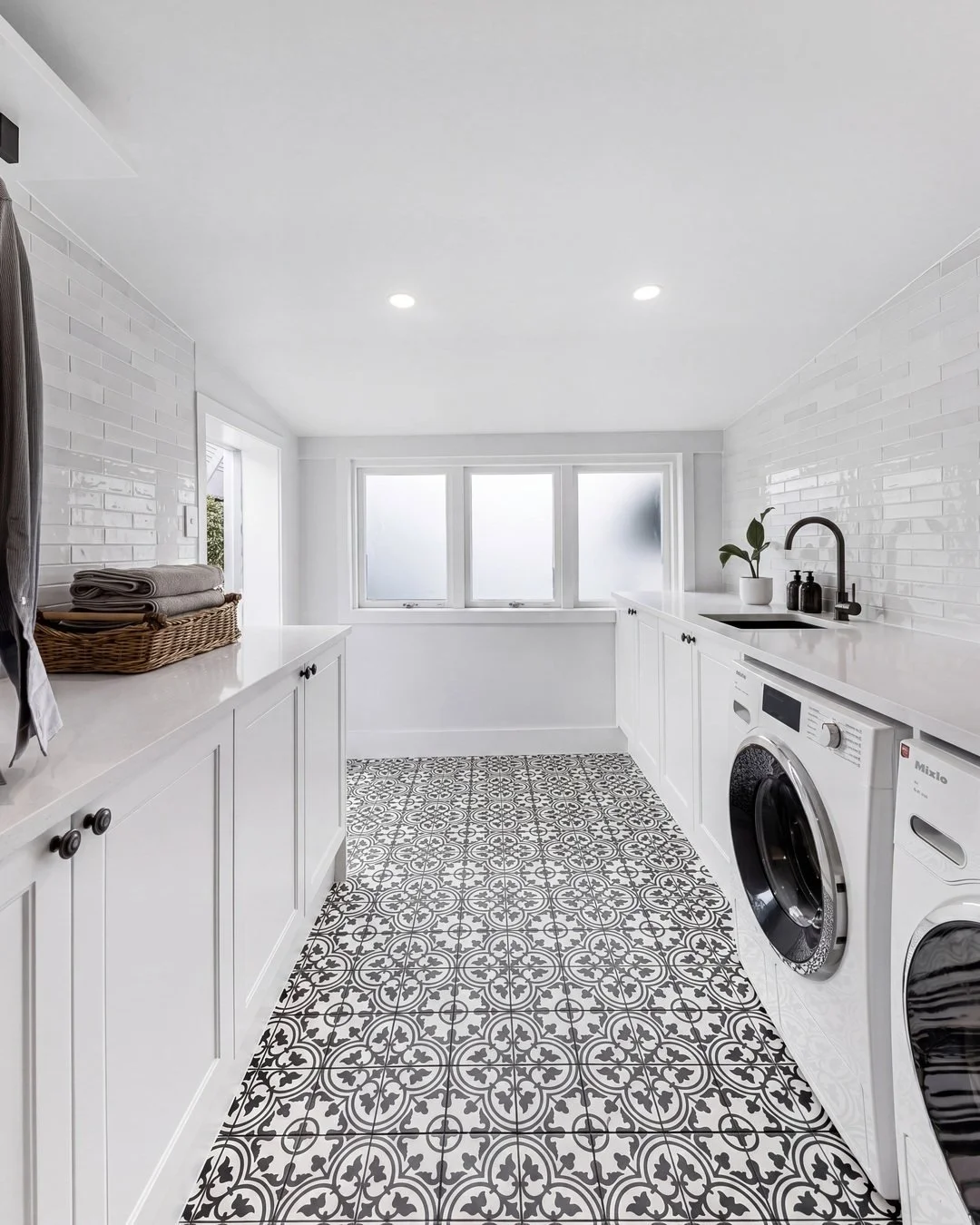 Full length engineered stone benchtop in the Seymour Street galley laundry, Auckland