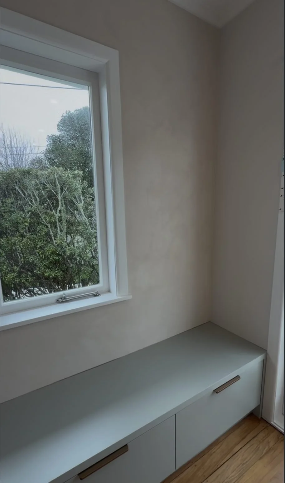 Finished built-in window seat with storage beneath in the Merani Street kitchen, Belmont