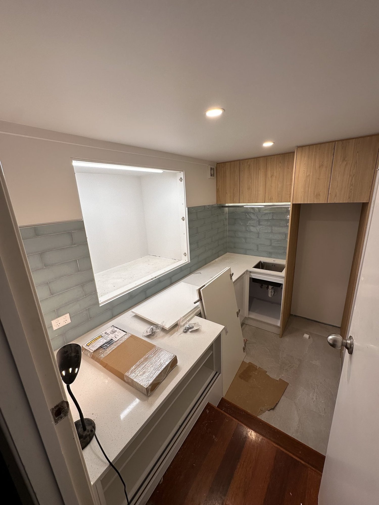The rebuilt display recess with LED strip lighting during fit-off, Rarangi Road laundry St Heliers