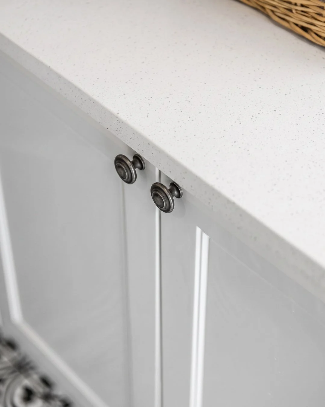 Knurled gunmetal knobs on white shaker laundry cabinetry, St Marys Bay renovation