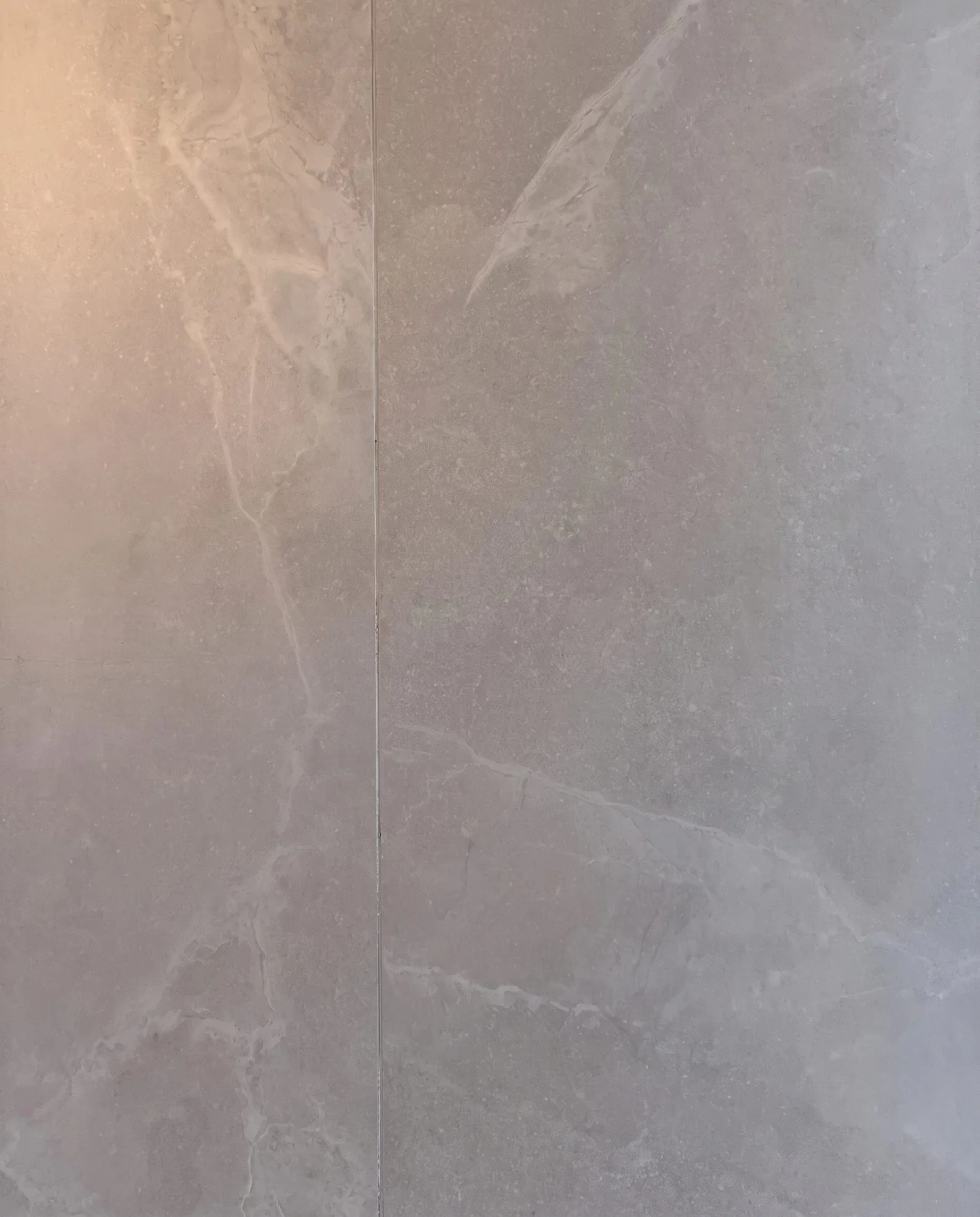 Large-format pale greige marble-look porcelain slab detail, Churchouse Road family bathroom, Greenhithe