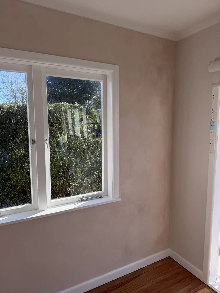 Plastered kitchen walls before painting in the Belmont renovation