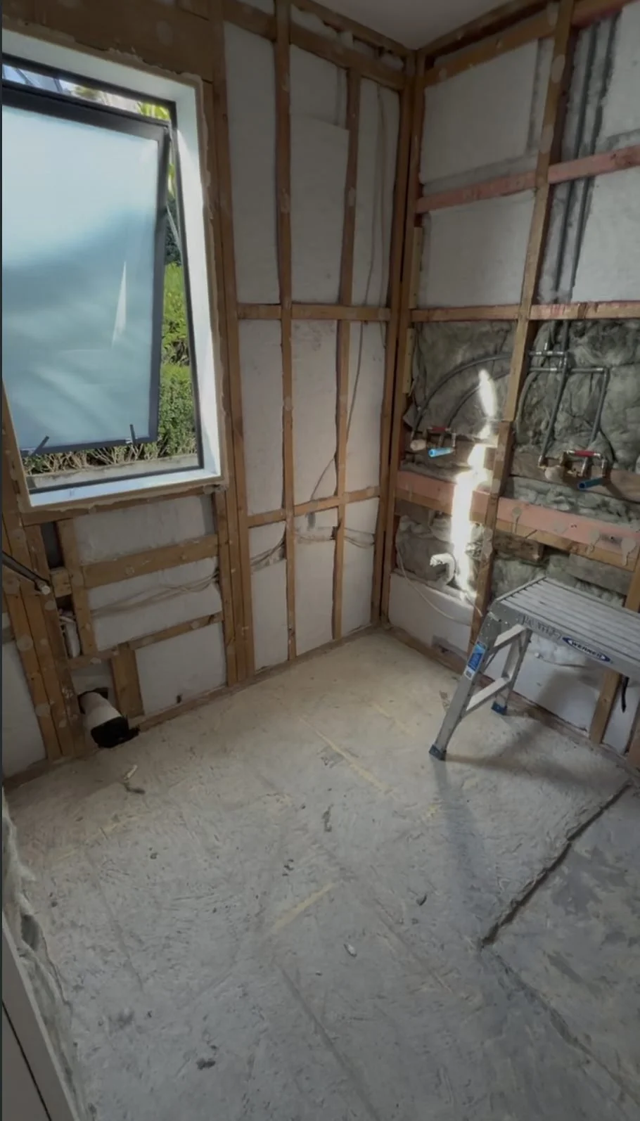 Greenhithe master bathroom stripped back to bare timber framing during renovation