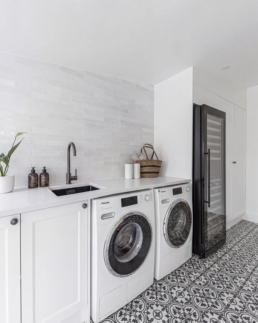 Laundry bench run with washer and dryer under the benchtop, St Marys Bay renovation