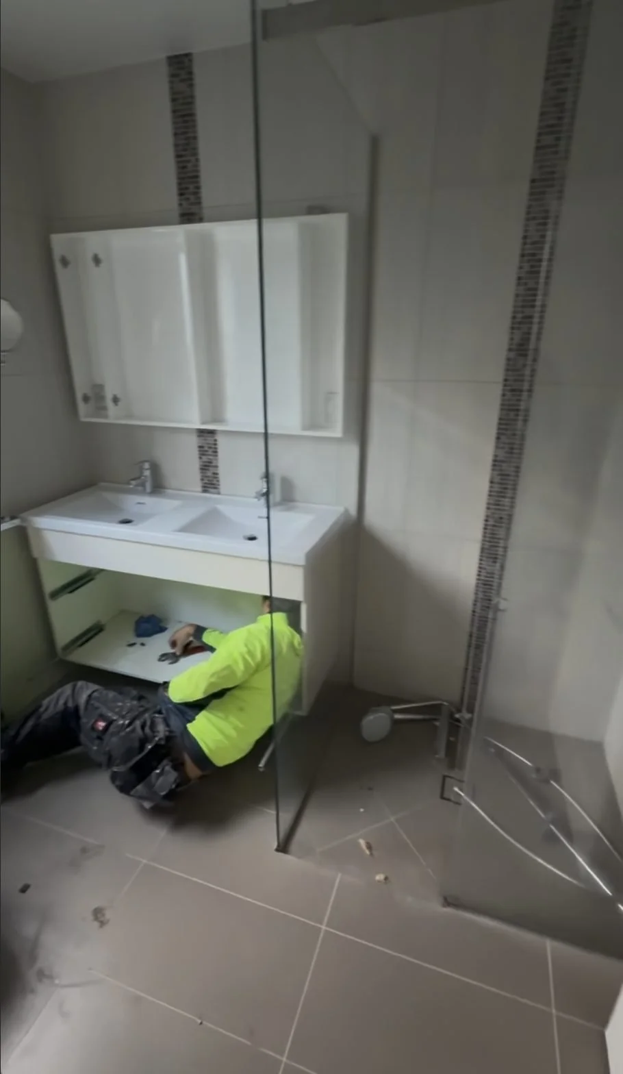 The old laminate double vanity and inset basins being decommissioned in the Greenhithe master bathroom