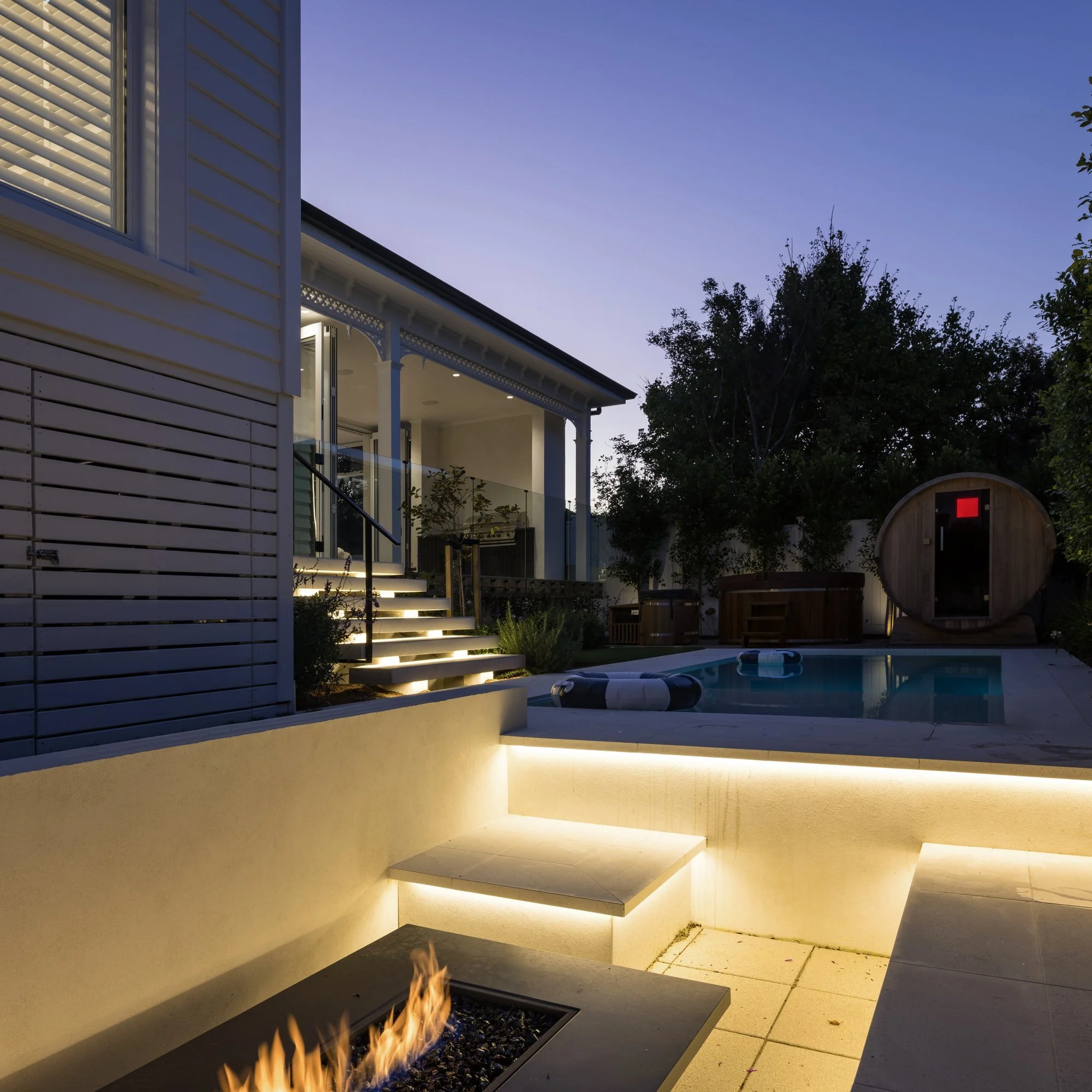 Auckland home extension at dusk by Key Interiors