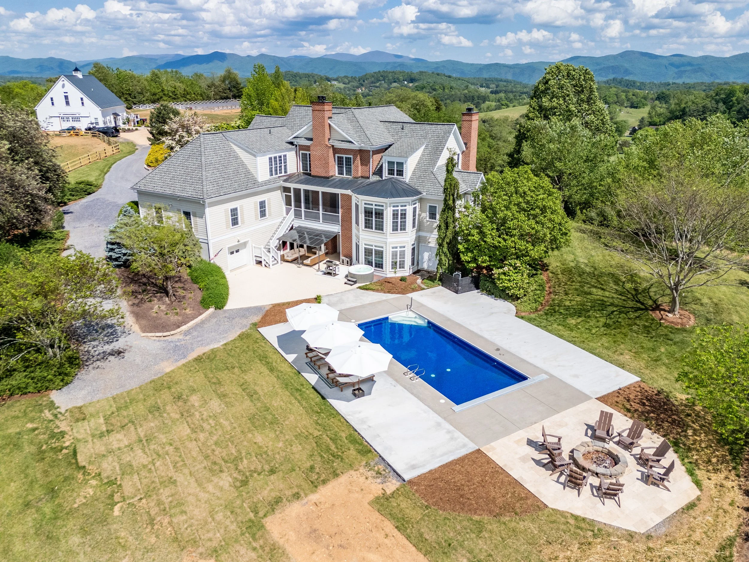 Aerial view of Peony Hill, the pool and the Blue Ridge Mountains