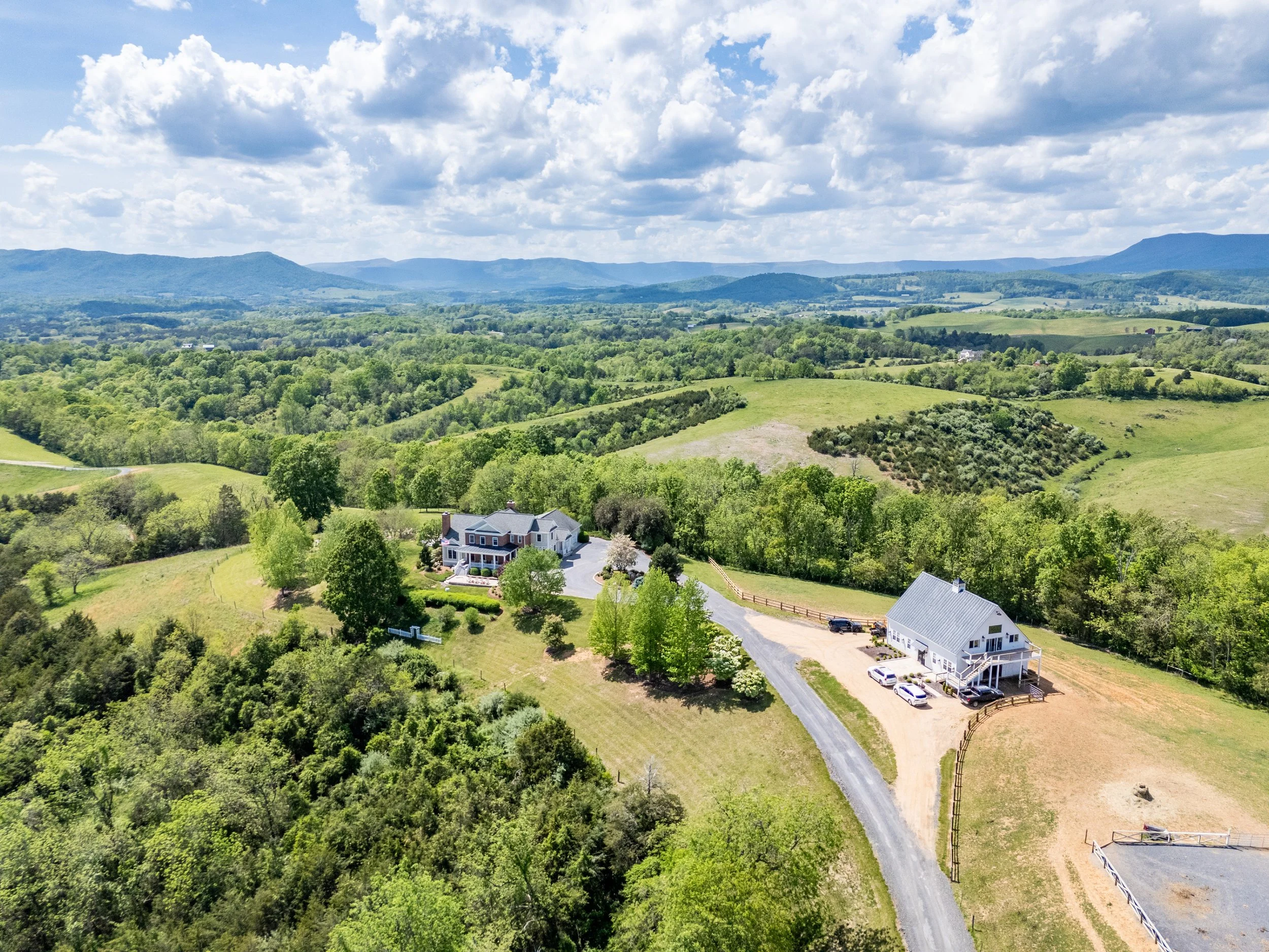 Aerial view of Peony Hill, the pool and the Blue Ridge Mountains