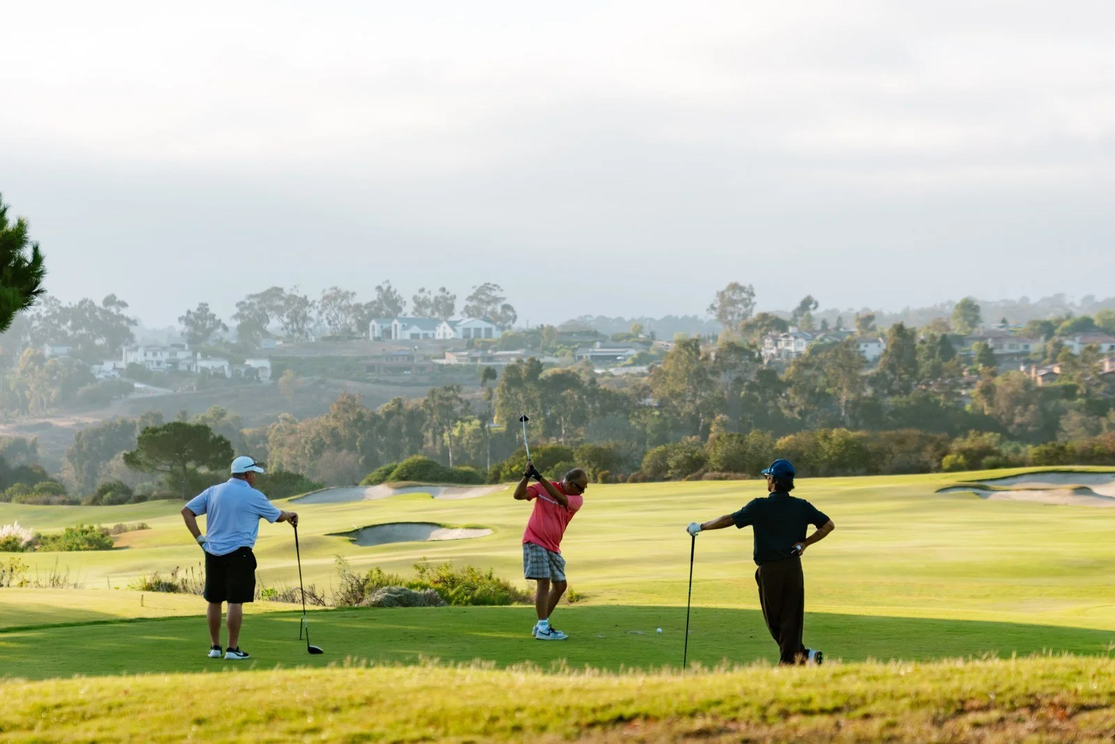 Guests playing golf at Fairmont