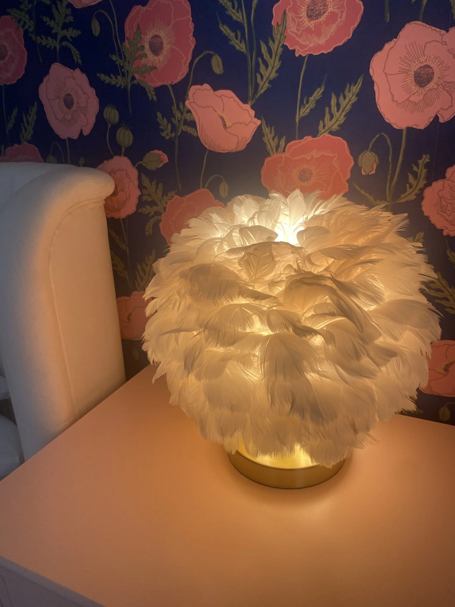 A feather lamp glowing in the Marilyn Suite