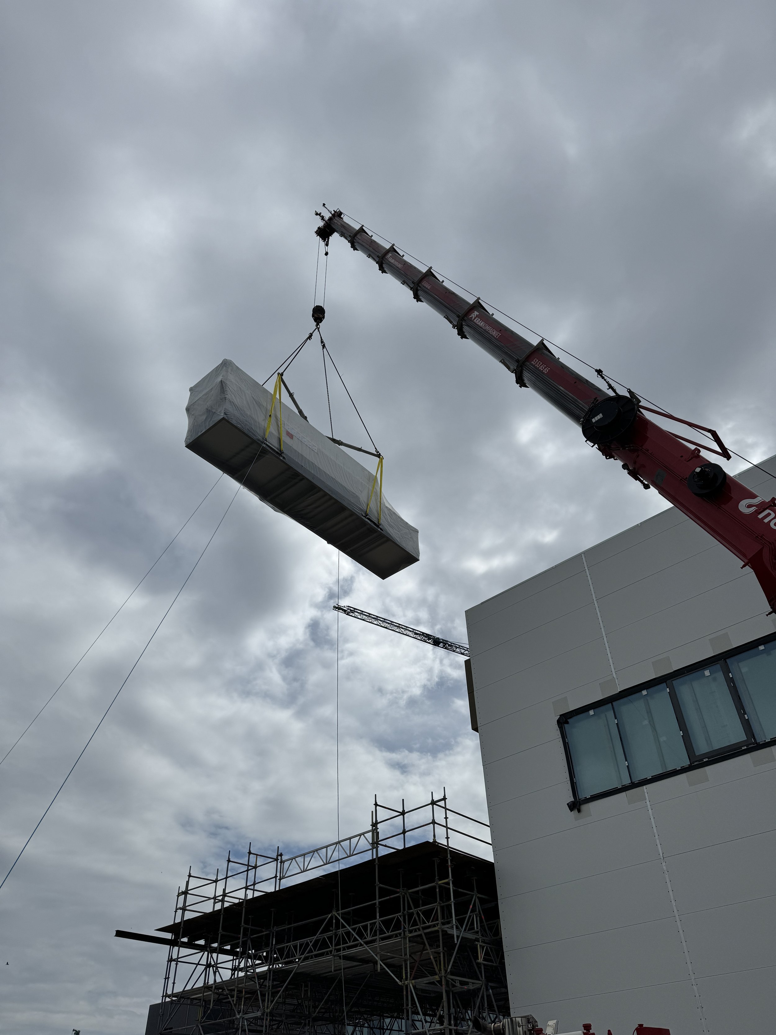 AHU being lifted into position