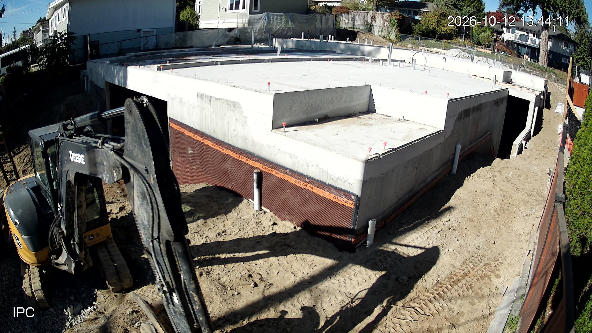 Completed concrete foundation and parkade slab at 1161 Madore, October 2026