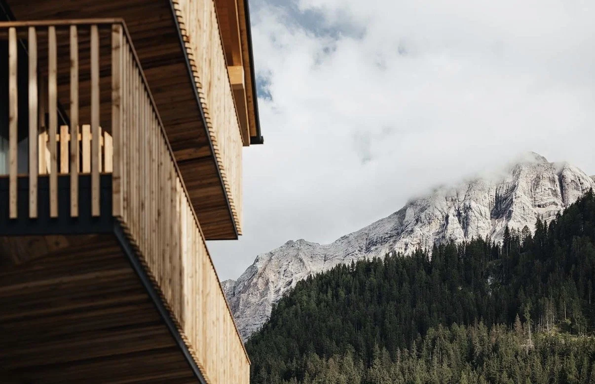 Chalet balcony looking out to Dolomite peaks