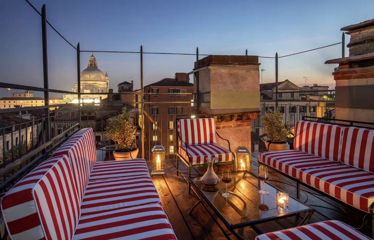 Rooftop terrace above Venice at dusk