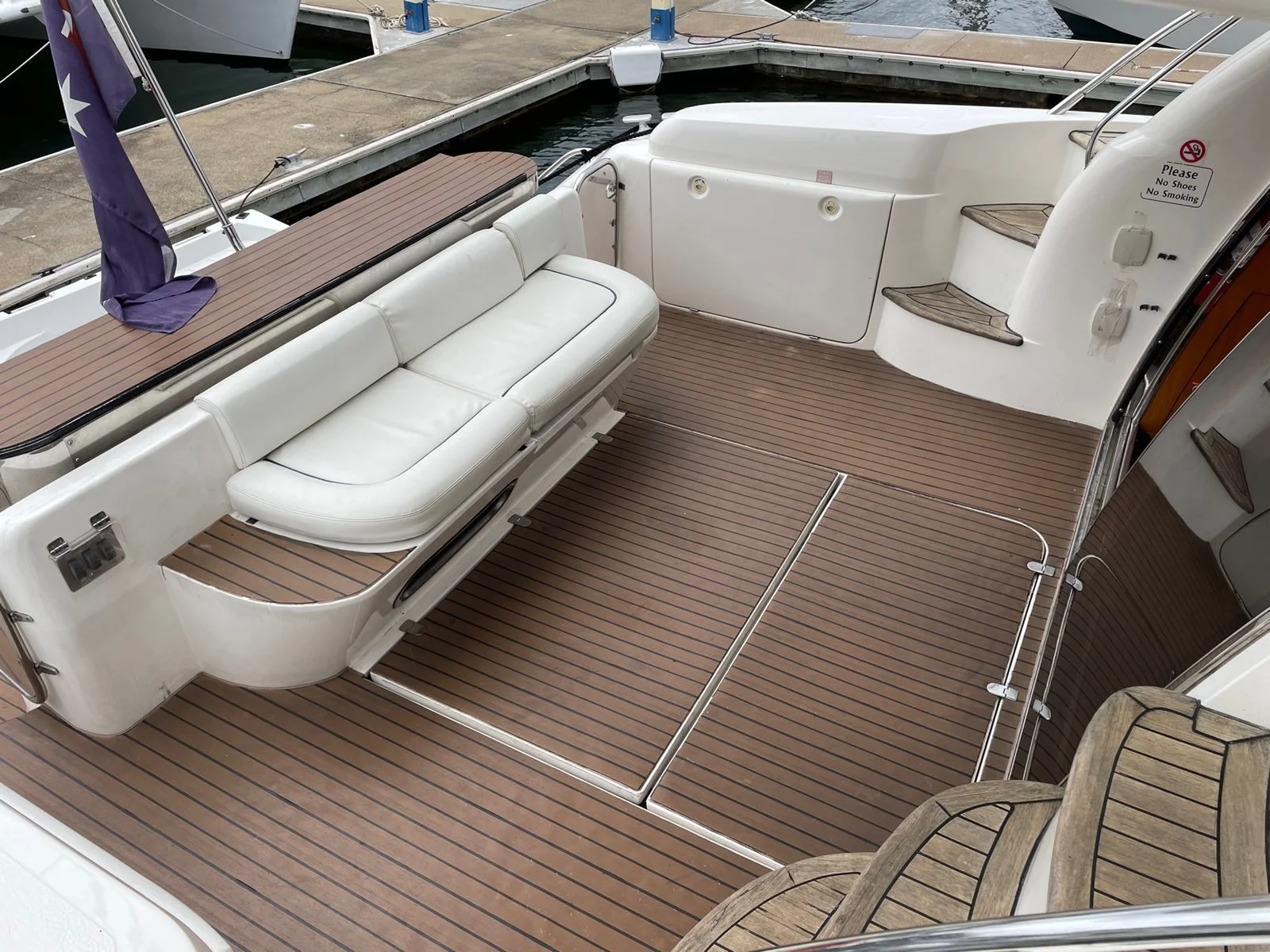 Teak deck and lounge seating on Inspiration yacht