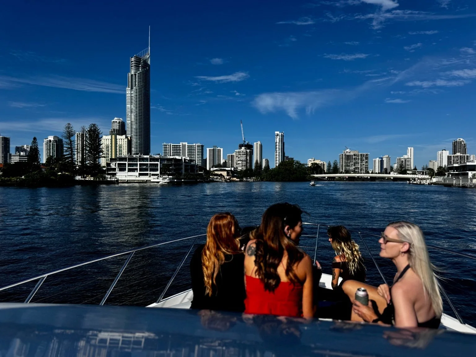 Yacht cruising past Q1 and Gold Coast waterfront homes