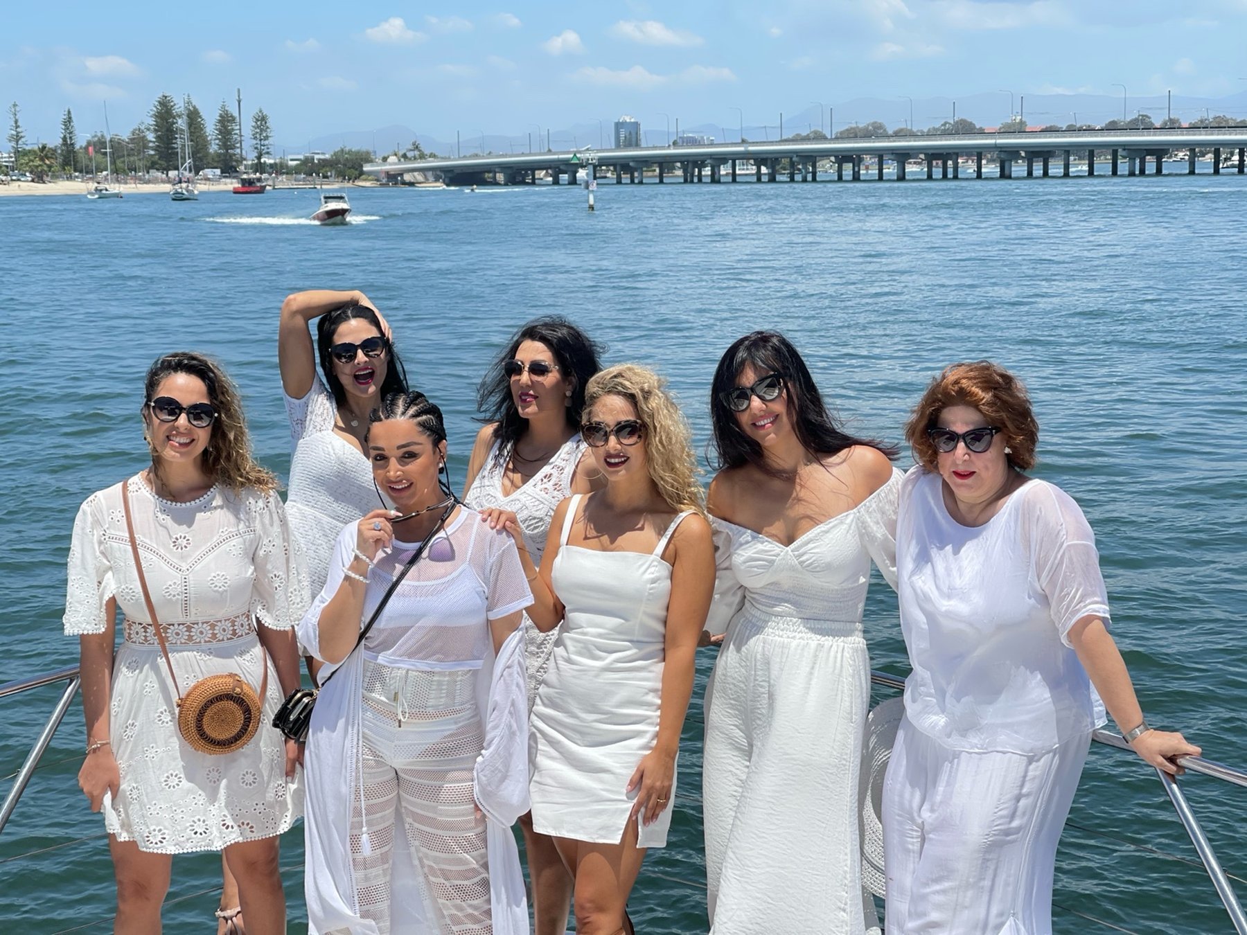 White-themed cruise group photo - Christmas style