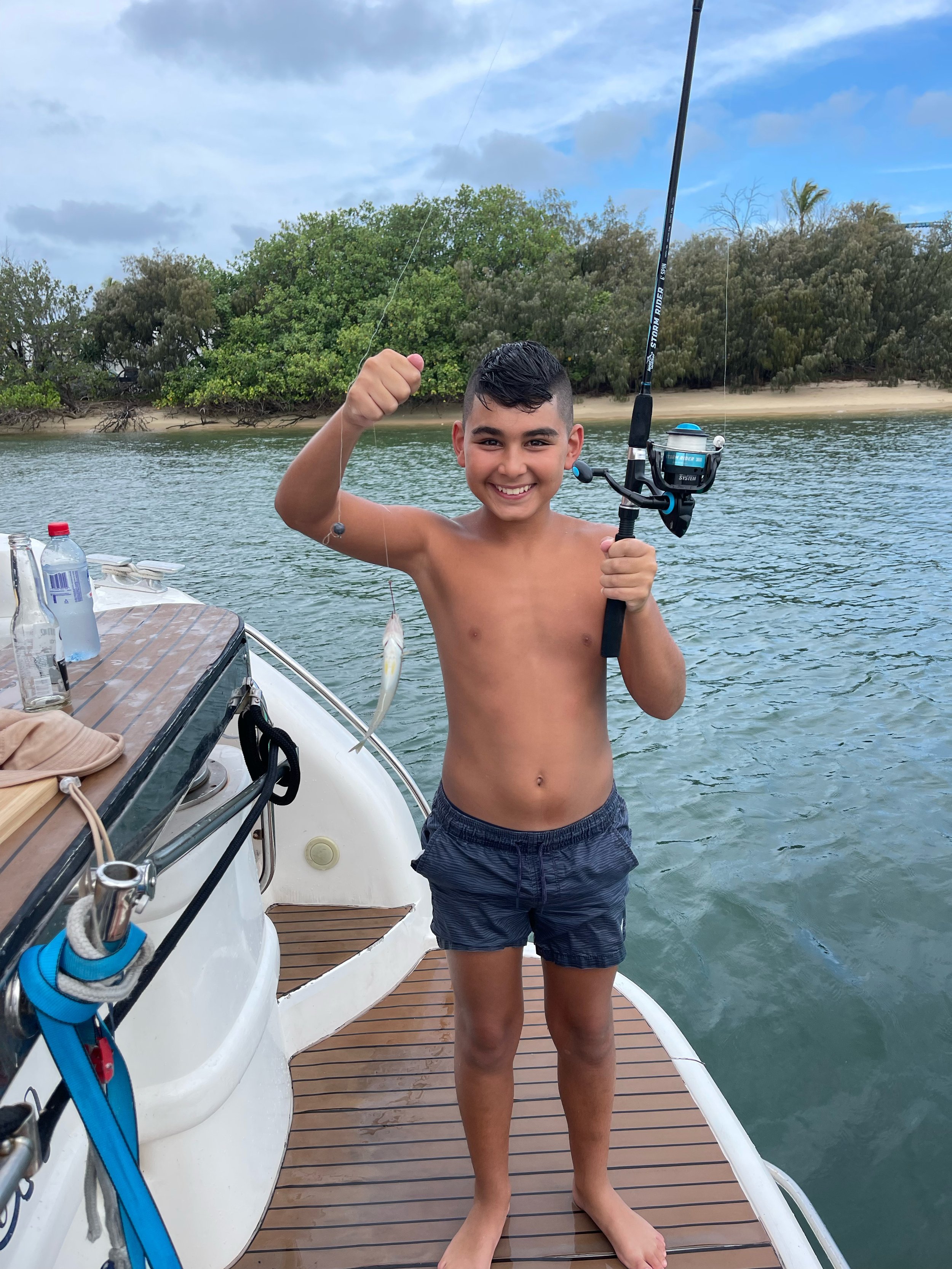 Family fishing cruise near Wavebreak Island Gold Coast
