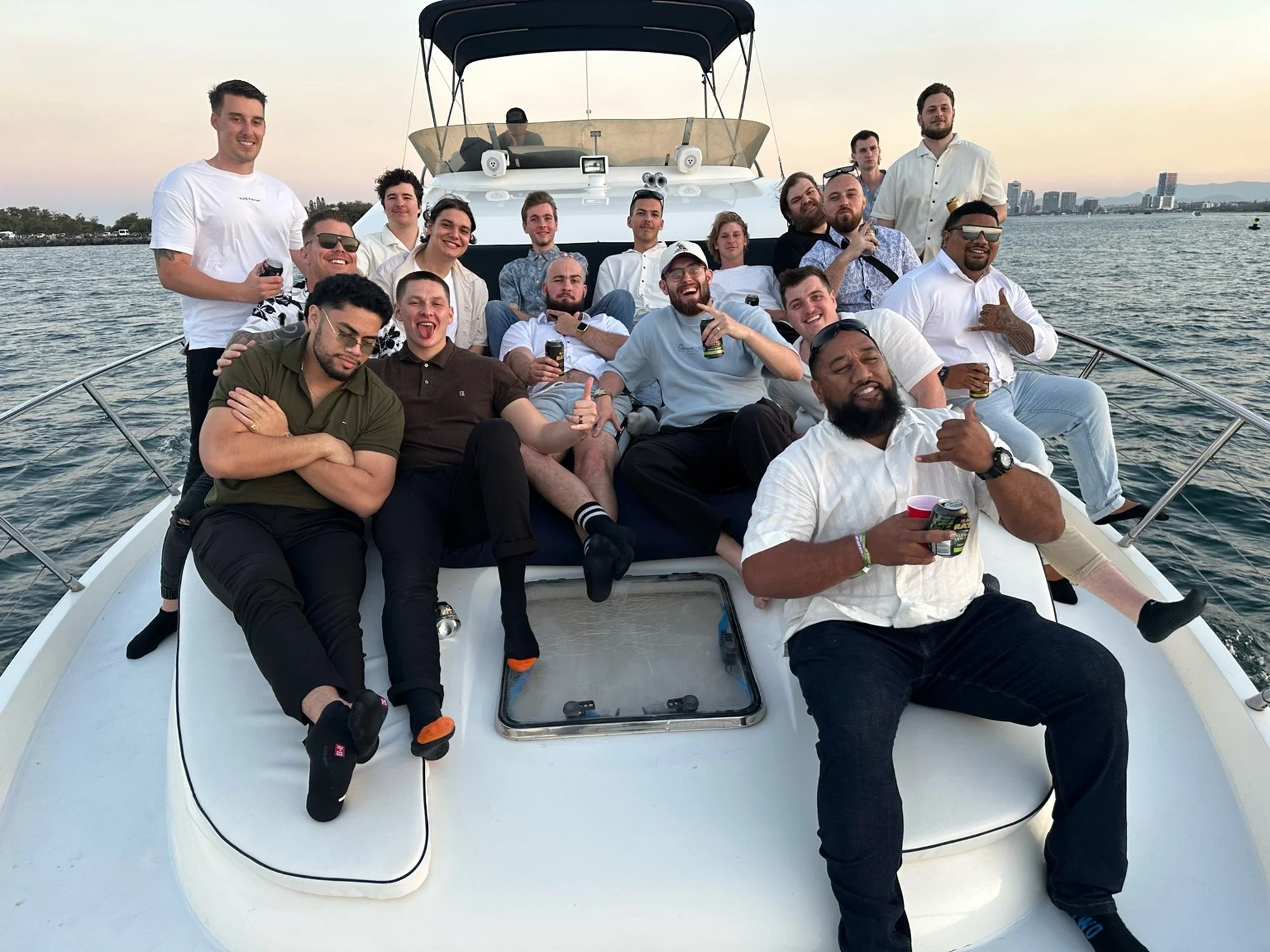 Sunset drinks on a bucks party cruise