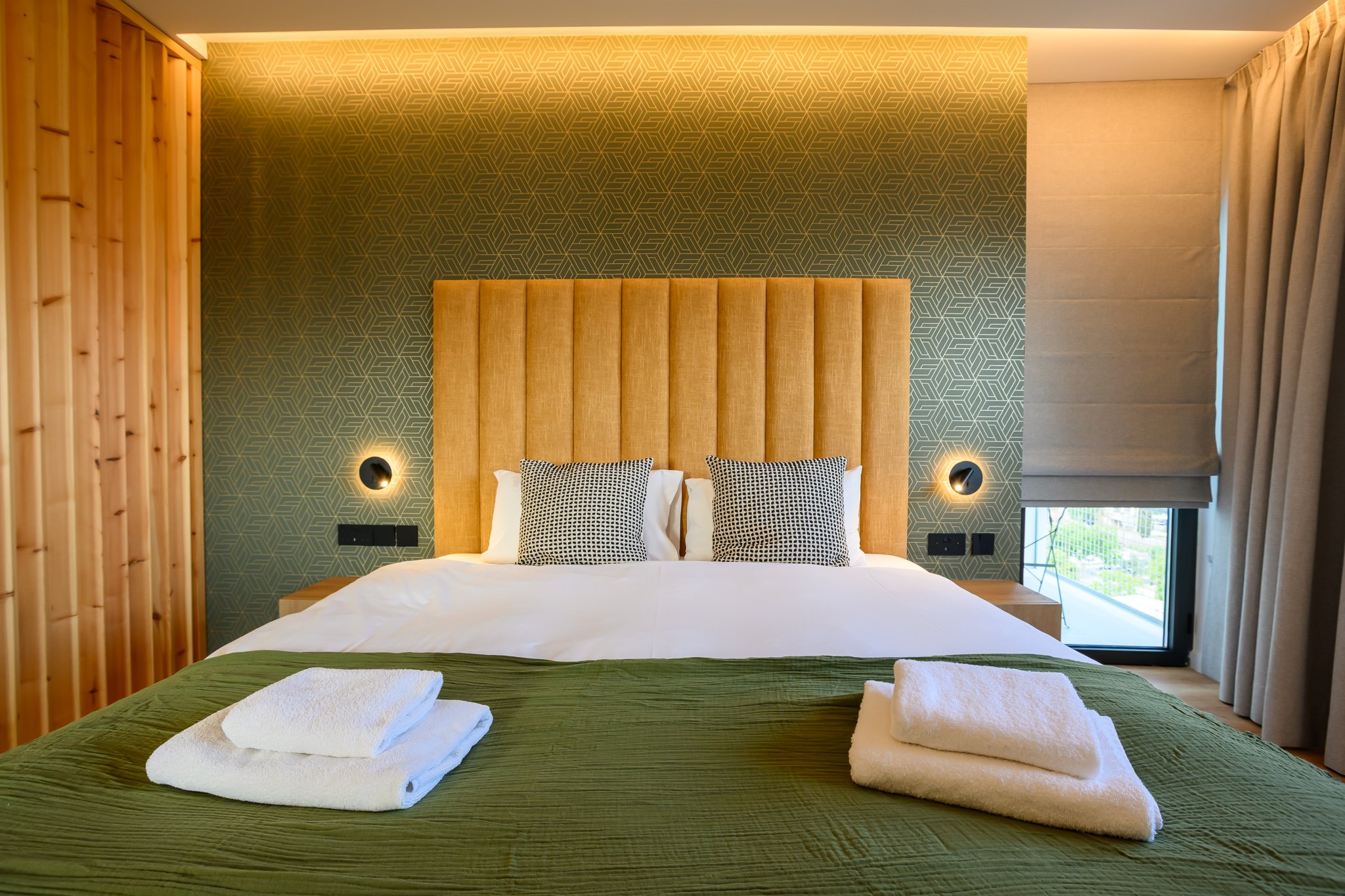 Nisia Corner Suite — Bed with hotel-grade linens