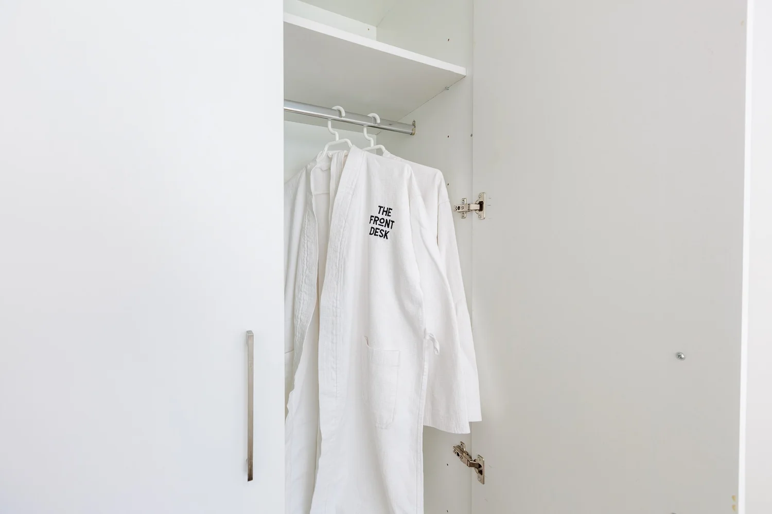 Antoinette Court — Wardrobe with bathrobes