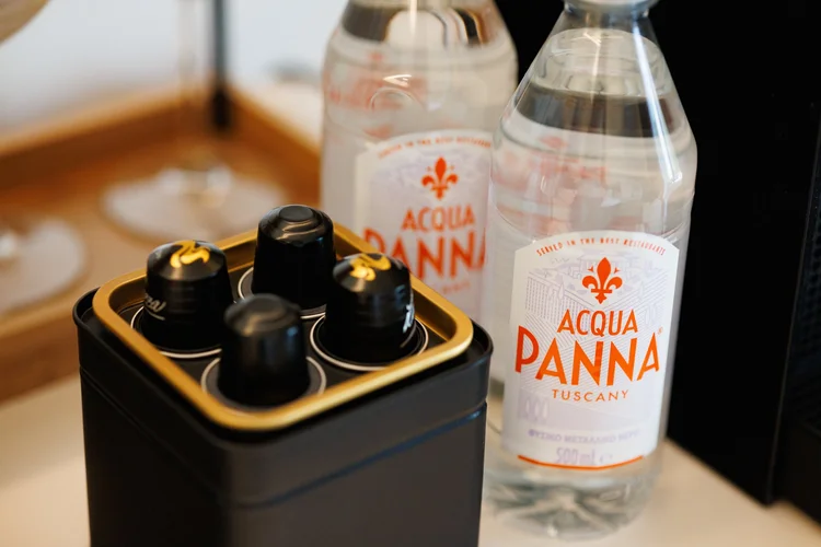 The Palm Suites — Capsules & Acqua Panna