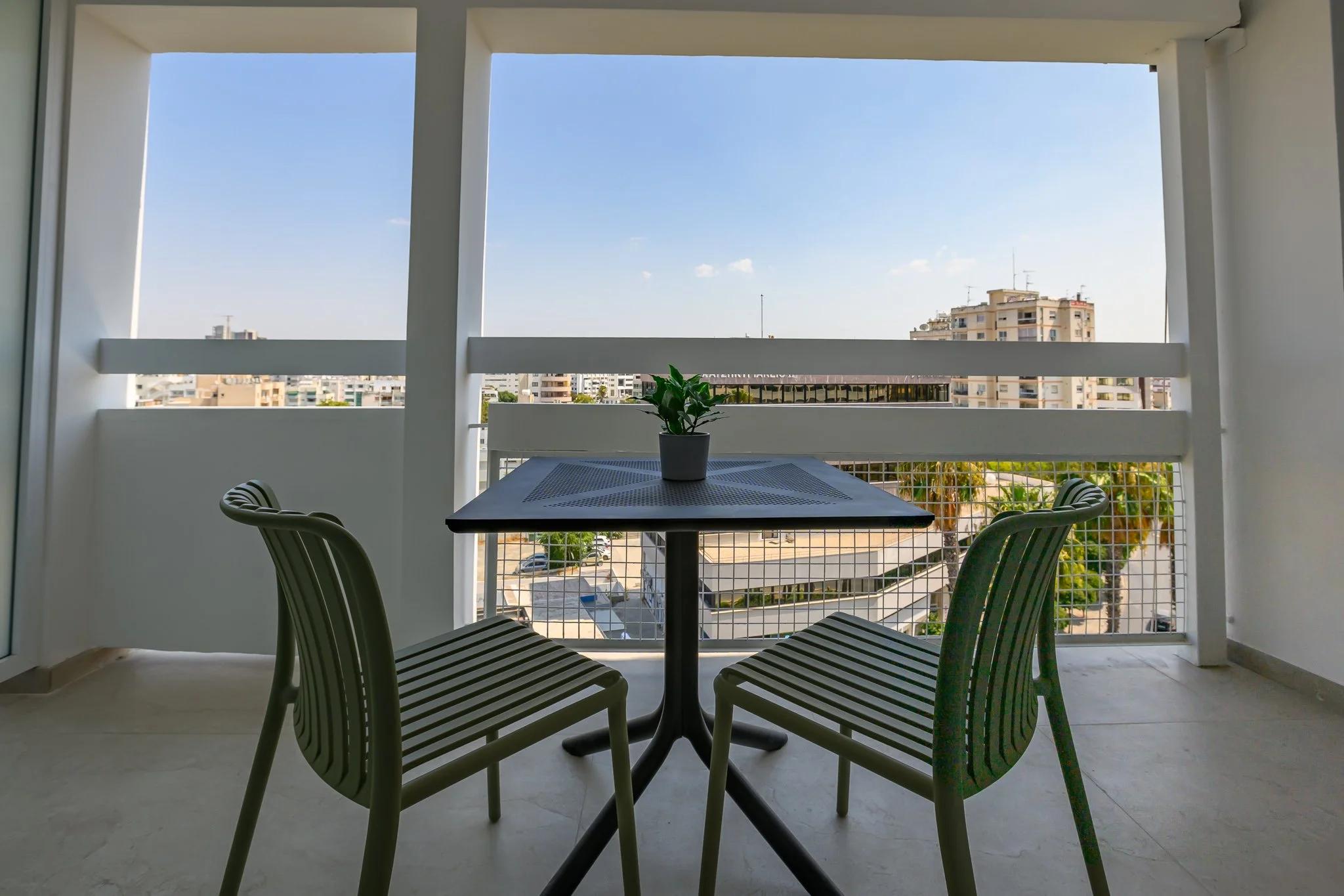 Nisia Junior Suite — Private terrace with city views