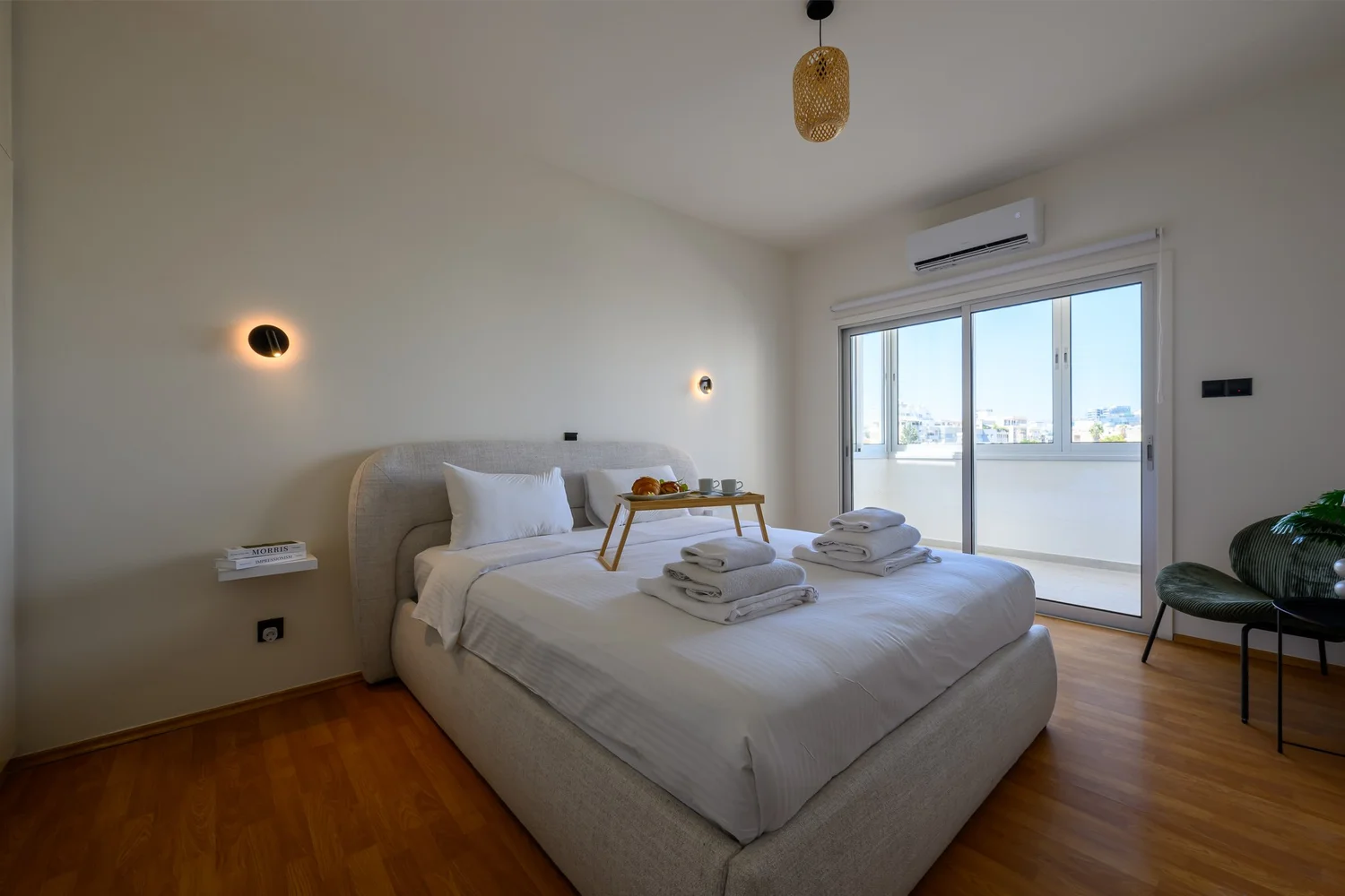Calian Court — Bedroom one, opening onto the balcony
