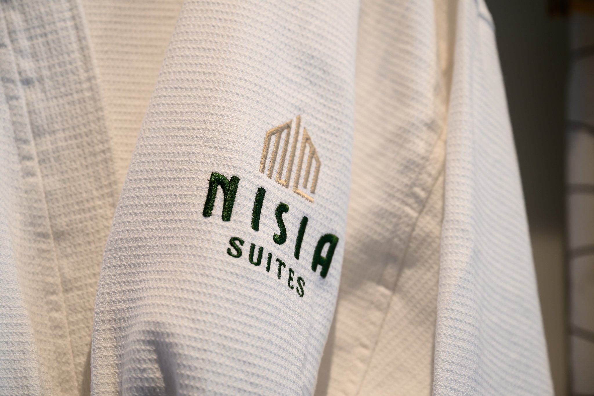 Nisia Classic Suite amenity — Embroidered robes