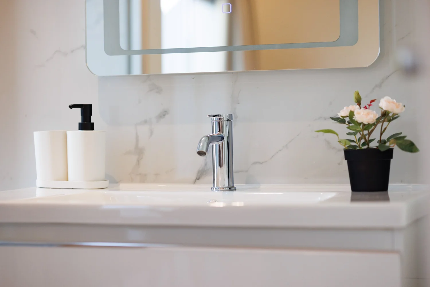 The Palm Suites Suite 2 — Bathroom vanity