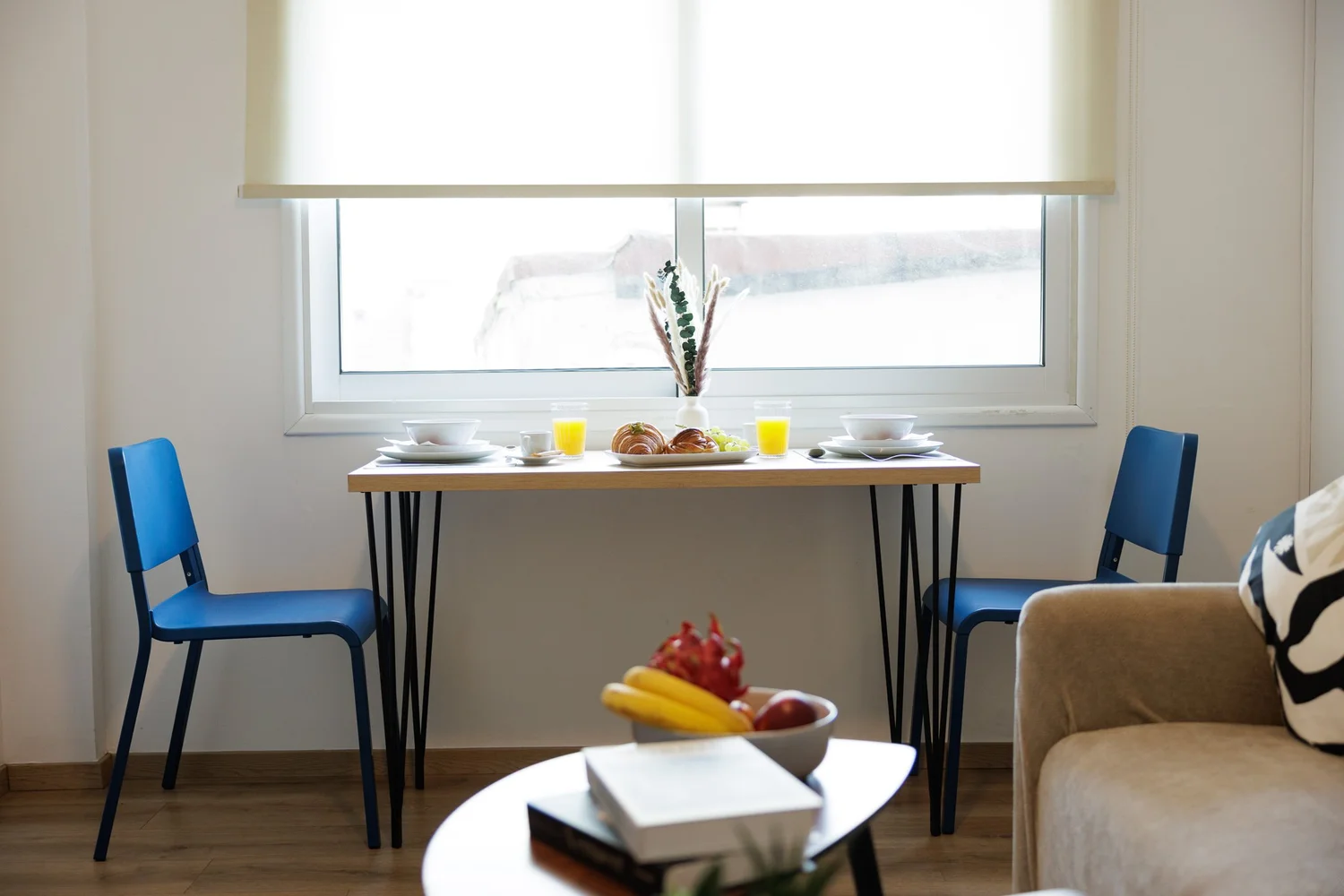 Antoinette Court — Dining table by the window