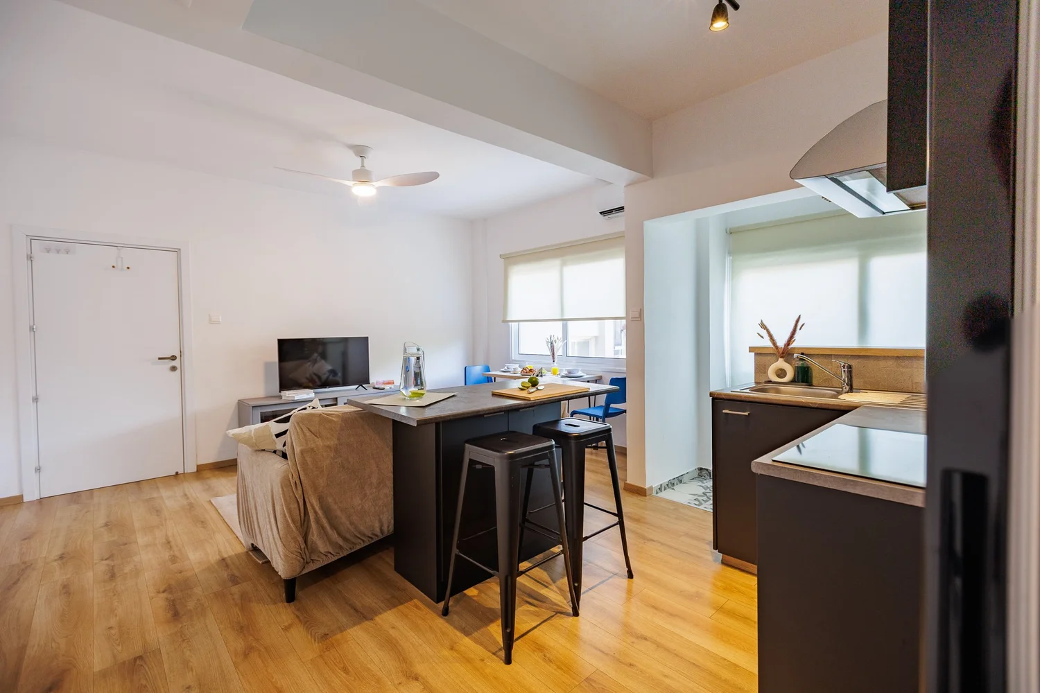 Antoinette Court — Living room through to the kitchen island