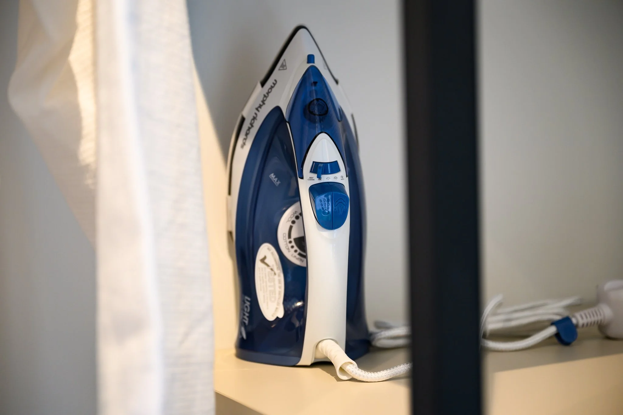 Nisia Signature Suite amenity — Iron and ironing board