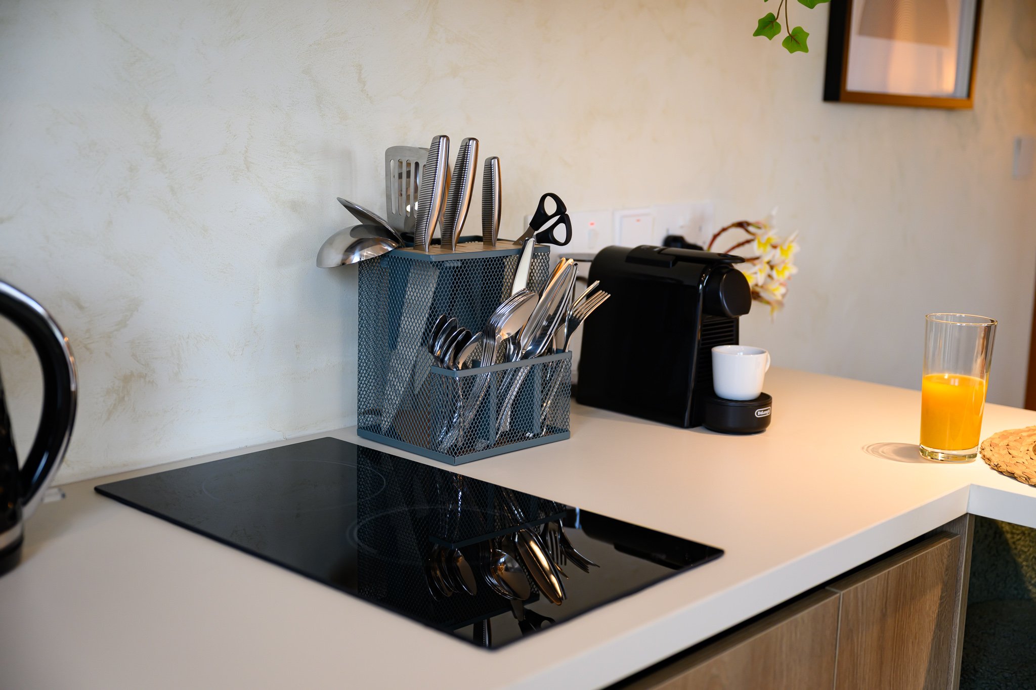 Nisia Corner Suite amenity — Induction hob and Nespresso