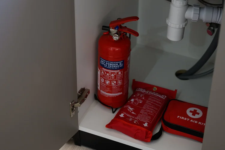 Calian Court amenity — First aid kit and fire extinguisher