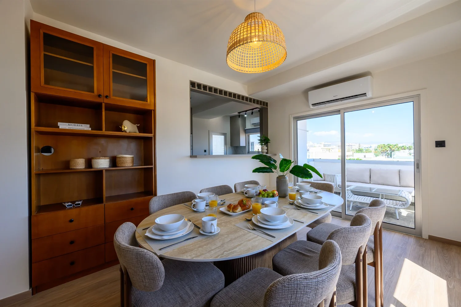 Calian Court — Dining for six, with balcony doors