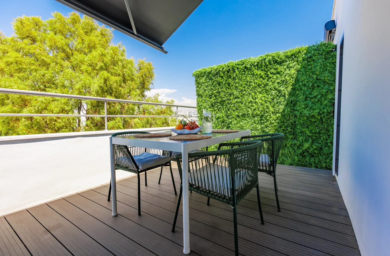 The Palm Suites Suite 2 — Al fresco dining on the private terrace