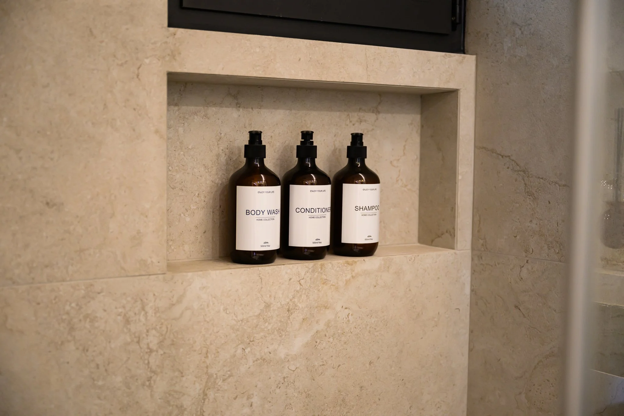 Nisia Junior Suite amenity — Shampoo, conditioner and body wash